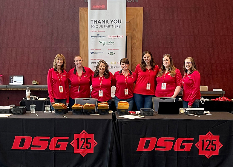 DSG 125 Celebration - Registration Team in Red Shirts